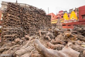 Pile of wood used at ghats crematorium of Varanasi, India. Shot with DOF.